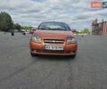 Оранжевый Шевроле Авео, объемом двигателя 1.5 л и пробегом 150 тыс. км за 2850 $, фото 1 на Automoto.ua