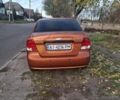 Оранжевый Шевроле Авео, объемом двигателя 1.5 л и пробегом 260 тыс. км за 2600 $, фото 5 на Automoto.ua