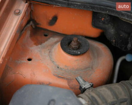 Помаранчевий Шевроле Авео, об'ємом двигуна 1.5 л та пробігом 300 тис. км за 2606 $, фото 1 на Automoto.ua