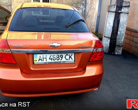 Оранжевый Шевроле Авео, объемом двигателя 1.6 л и пробегом 150 тыс. км за 2700 $, фото 2 на Automoto.ua