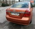 Оранжевый Шевроле Авео, объемом двигателя 1.6 л и пробегом 194 тыс. км за 3900 $, фото 2 на Automoto.ua