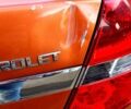 Оранжевый Шевроле Авео, объемом двигателя 1.6 л и пробегом 150 тыс. км за 2700 $, фото 1 на Automoto.ua