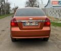 Оранжевый Шевроле Авео, объемом двигателя 1.6 л и пробегом 42 тыс. км за 5200 $, фото 3 на Automoto.ua