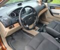 Оранжевый Шевроле Авео, объемом двигателя 1.6 л и пробегом 175 тыс. км за 3500 $, фото 1 на Automoto.ua