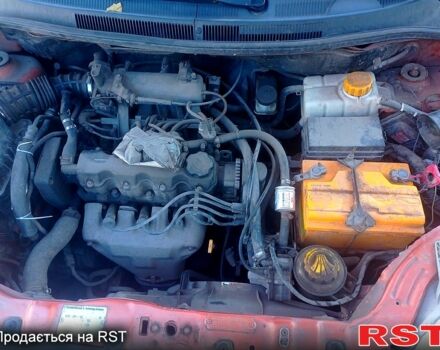 Оранжевый Шевроле Авео, объемом двигателя 1.5 л и пробегом 235 тыс. км за 2800 $, фото 3 на Automoto.ua