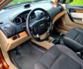 Оранжевый Шевроле Авео, объемом двигателя 1.6 л и пробегом 175 тыс. км за 3800 $, фото 1 на Automoto.ua