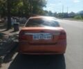 Оранжевый Шевроле Авео, объемом двигателя 1.6 л и пробегом 180 тыс. км за 3800 $, фото 2 на Automoto.ua