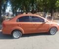 Оранжевый Шевроле Авео, объемом двигателя 1.6 л и пробегом 180 тыс. км за 3800 $, фото 1 на Automoto.ua