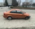 Помаранчевий Шевроле Авео, об'ємом двигуна 1.6 л та пробігом 177 тис. км за 3199 $, фото 1 на Automoto.ua