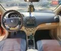 Оранжевый Шевроле Авео, объемом двигателя 1.6 л и пробегом 233 тыс. км за 3800 $, фото 1 на Automoto.ua