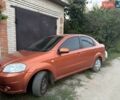 Оранжевый Шевроле Авео, объемом двигателя 1.6 л и пробегом 150 тыс. км за 2800 $, фото 1 на Automoto.ua