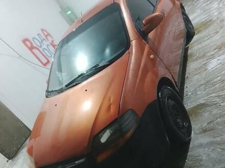 Оранжевый Шевроле Авео, объемом двигателя 1.5 л и пробегом 190 тыс. км за 1599 $, фото 1 на Automoto.ua