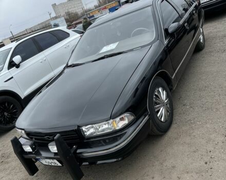 Черный Шевроле Каприз, объемом двигателя 5 л и пробегом 230 тыс. км за 9900 $, фото 1 на Automoto.ua
