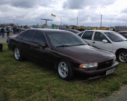 Красный Шевроле Каприз, объемом двигателя 4.3 л и пробегом 153 тыс. км за 9999 $, фото 1 на Automoto.ua