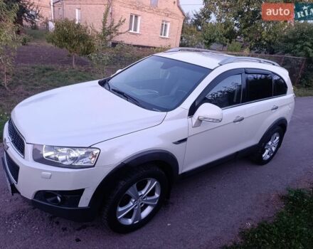 Белый Шевроле Каптива, объемом двигателя 3 л и пробегом 193 тыс. км за 7800 $, фото 1 на Automoto.ua