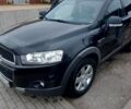 Чорний Шевроле Каптіва, об'ємом двигуна 2.4 л та пробігом 330 тис. км за 9849 $, фото 1 на Automoto.ua