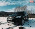 Черный Шевроле Каптива, объемом двигателя 2.4 л и пробегом 172 тыс. км за 8500 $, фото 1 на Automoto.ua