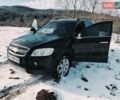 Черный Шевроле Каптива, объемом двигателя 2.4 л и пробегом 172 тыс. км за 8500 $, фото 6 на Automoto.ua