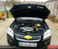Черный Шевроле Каптива, объемом двигателя 2.4 л и пробегом 186 тыс. км за 7800 $, фото 2 на Automoto.ua