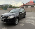 Черный Шевроле Каптива, объемом двигателя 2.41 л и пробегом 243 тыс. км за 8000 $, фото 1 на Automoto.ua