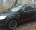 Черный Шевроле Каптива, объемом двигателя 2.4 л и пробегом 245 тыс. км за 7500 $, фото 1 на Automoto.ua