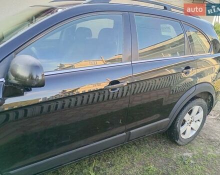 Черный Шевроле Каптива, объемом двигателя 2.4 л и пробегом 298 тыс. км за 7200 $, фото 1 на Automoto.ua