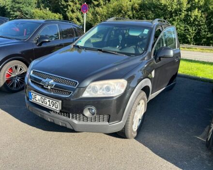 Черный Шевроле Каптива, объемом двигателя 2.4 л и пробегом 250 тыс. км за 5000 $, фото 1 на Automoto.ua