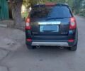 Черный Шевроле Каптива, объемом двигателя 2.4 л и пробегом 180 тыс. км за 8500 $, фото 7 на Automoto.ua