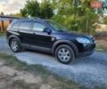 Черный Шевроле Каптива, объемом двигателя 2.41 л и пробегом 267 тыс. км за 8500 $, фото 2 на Automoto.ua