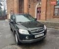 Черный Шевроле Каптива, объемом двигателя 2.4 л и пробегом 180 тыс. км за 8000 $, фото 1 на Automoto.ua