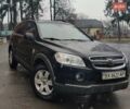 Черный Шевроле Каптива, объемом двигателя 2.4 л и пробегом 180 тыс. км за 8000 $, фото 1 на Automoto.ua