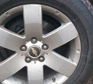 Черный Шевроле Каптива, объемом двигателя 2.4 л и пробегом 280 тыс. км за 7100 $, фото 12 на Automoto.ua