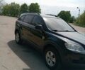 Черный Шевроле Каптива, объемом двигателя 2.4 л и пробегом 205 тыс. км за 8100 $, фото 2 на Automoto.ua