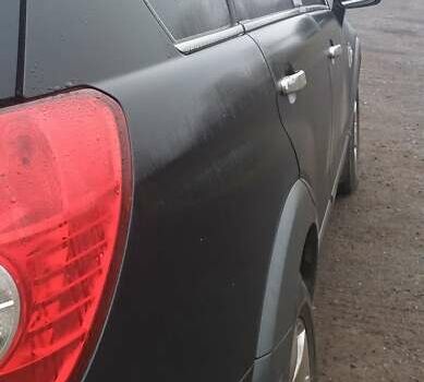 Черный Шевроле Каптива, объемом двигателя 2.4 л и пробегом 280 тыс. км за 7100 $, фото 13 на Automoto.ua