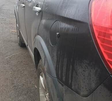 Черный Шевроле Каптива, объемом двигателя 2.4 л и пробегом 280 тыс. км за 7100 $, фото 14 на Automoto.ua