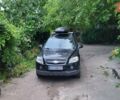 Черный Шевроле Каптива, объемом двигателя 2.4 л и пробегом 310 тыс. км за 9450 $, фото 3 на Automoto.ua