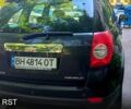 Черный Шевроле Каптива, объемом двигателя 2.4 л и пробегом 180 тыс. км за 9500 $, фото 4 на Automoto.ua