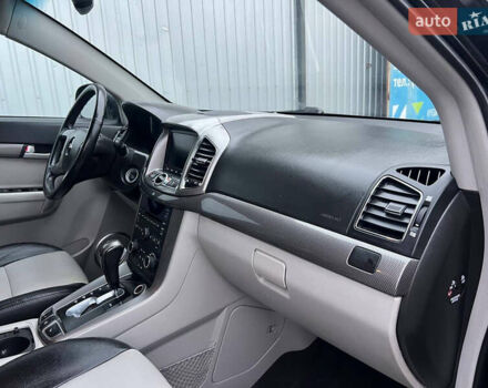 Черный Шевроле Каптива, объемом двигателя 2.2 л и пробегом 129 тыс. км за 12500 $, фото 68 на Automoto.ua