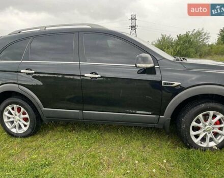 Черный Шевроле Каптива, объемом двигателя 2.23 л и пробегом 138 тыс. км за 12500 $, фото 26 на Automoto.ua