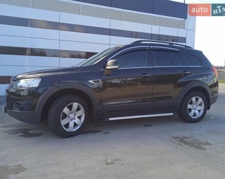 Черный Шевроле Каптива, объемом двигателя 2.23 л и пробегом 245 тыс. км за 11800 $, фото 1 на Automoto.ua