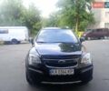Черный Шевроле Каптива, объемом двигателя 2.4 л и пробегом 175 тыс. км за 8300 $, фото 1 на Automoto.ua