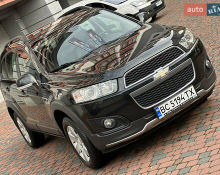 Черный Шевроле Каптива, объемом двигателя 2.38 л и пробегом 210 тыс. км за 11350 $, фото 1 на Automoto.ua