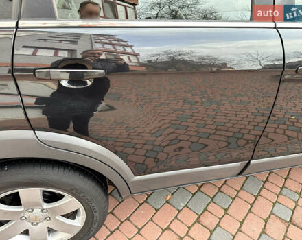 Черный Шевроле Каптива, объемом двигателя 2.38 л и пробегом 210 тыс. км за 11350 $, фото 102 на Automoto.ua