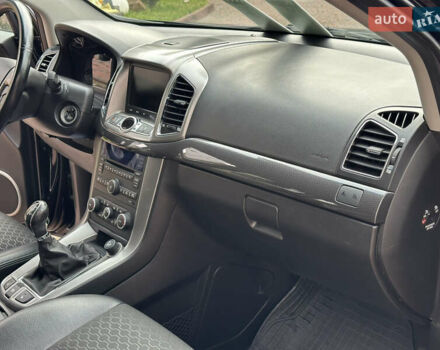 Черный Шевроле Каптива, объемом двигателя 2.38 л и пробегом 210 тыс. км за 11350 $, фото 151 на Automoto.ua