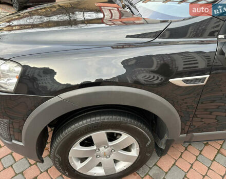 Черный Шевроле Каптива, объемом двигателя 2.38 л и пробегом 210 тыс. км за 11350 $, фото 96 на Automoto.ua