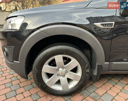 Черный Шевроле Каптива, объемом двигателя 2.38 л и пробегом 210 тыс. км за 11350 $, фото 60 на Automoto.ua