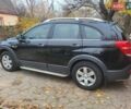 Черный Шевроле Каптива, объемом двигателя 2.38 л и пробегом 172 тыс. км за 11000 $, фото 4 на Automoto.ua