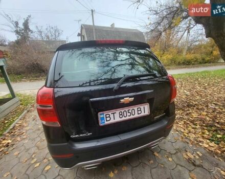 Черный Шевроле Каптива, объемом двигателя 2.38 л и пробегом 172 тыс. км за 11000 $, фото 3 на Automoto.ua