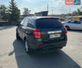 Черный Шевроле Каптива, объемом двигателя 2.38 л и пробегом 135 тыс. км за 12200 $, фото 4 на Automoto.ua