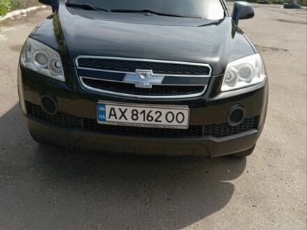 Черный Шевроле Каптива, объемом двигателя 2.4 л и пробегом 205 тыс. км за 8100 $, фото 1 на Automoto.ua